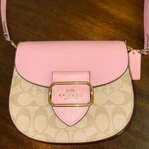 Pink coach saddle bag